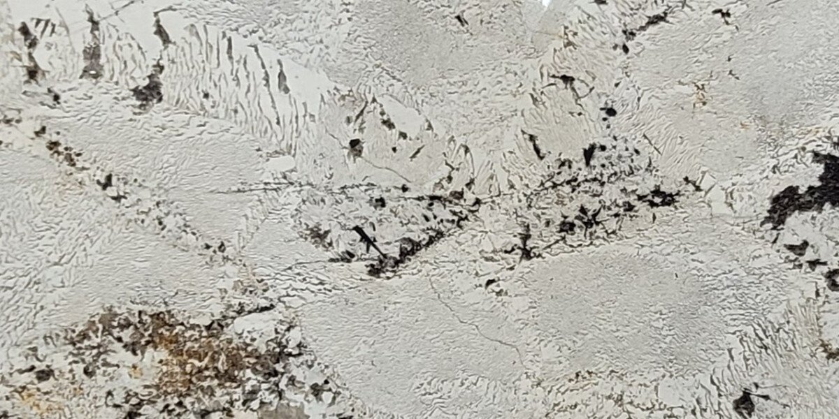 alpinus granite close up texture Alpinus granite close-up texture