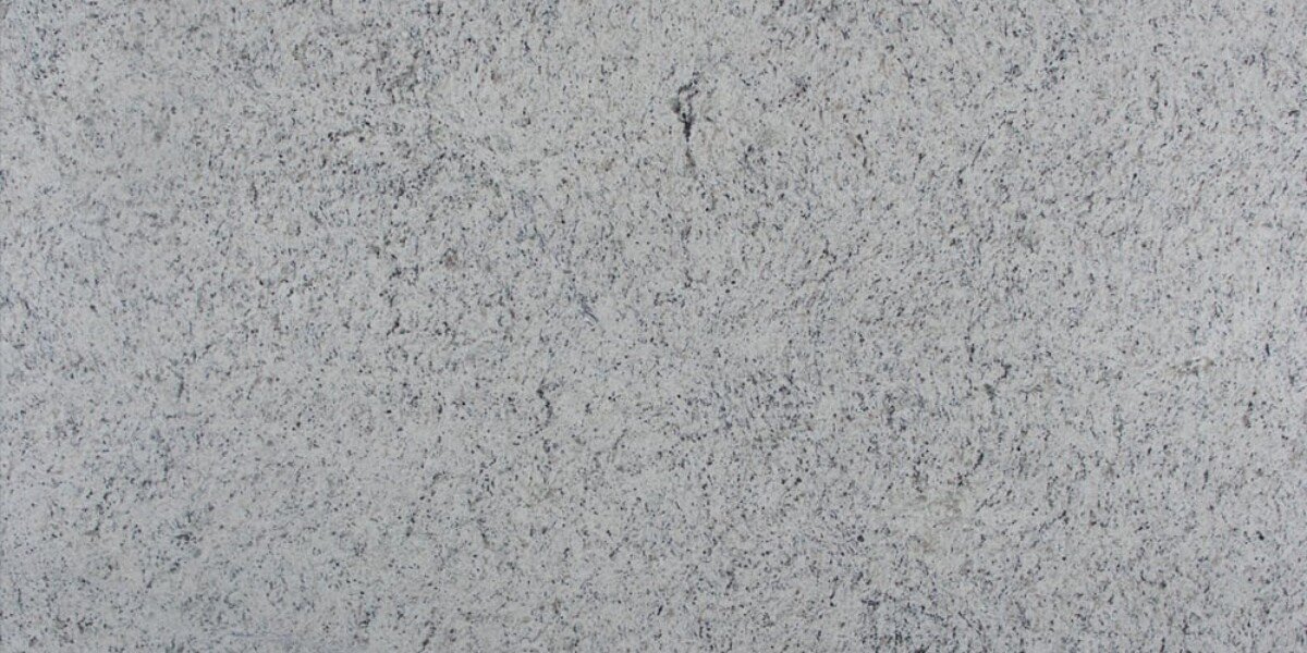 ornamental white granite close up texture Ornamental White granite close-up texture
